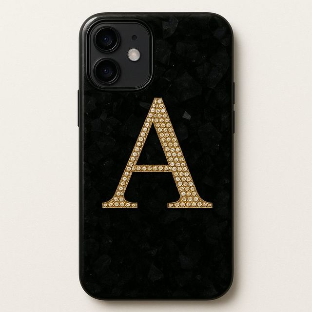 A black phone case with a large gold initial in gems - yours would be your own letter