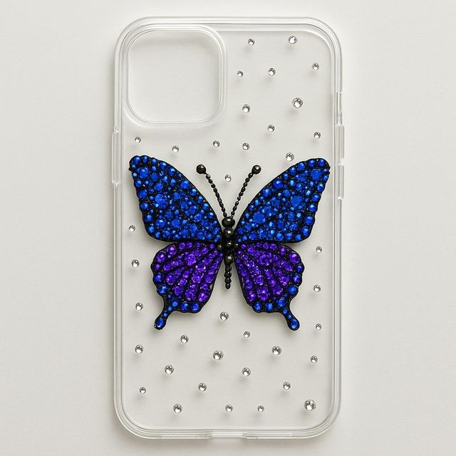 A clear phone case with a blue and violet gem butterfly