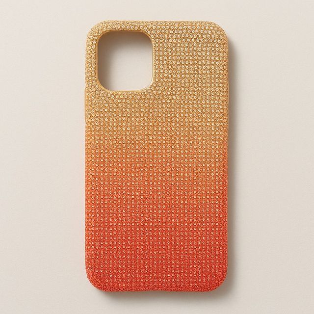 A phone case fading from deep orange up to pale gold