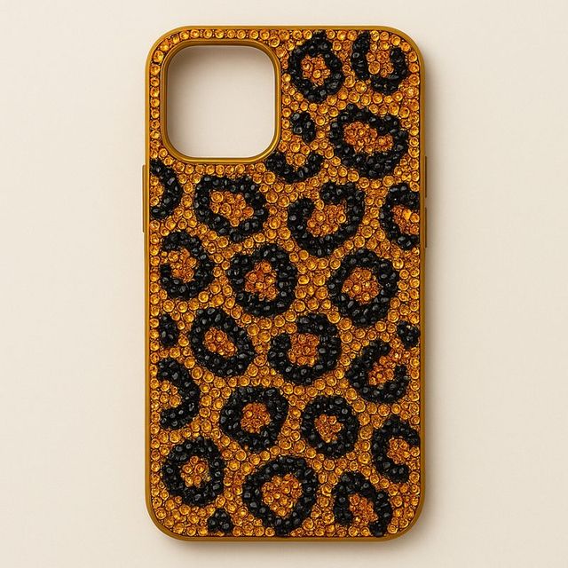 A golden phone case with amber and black leopard spots