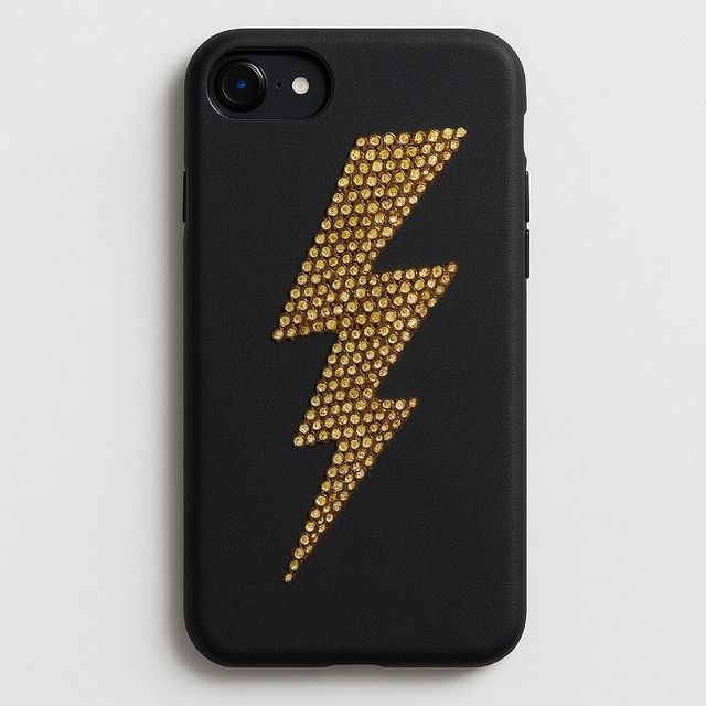 A matte black phone case with a gold lightning bolt