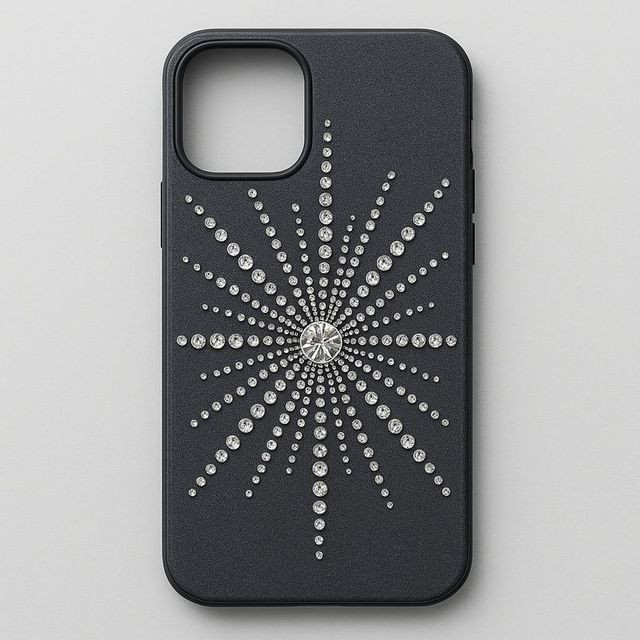 A charcoal phone case with a silver starburst from the centre